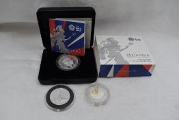 A 2017 2 Pound 1oz Silver Britannia Coin in case, a 50 Pound 2015 Silver Britannia Coin and a 5
