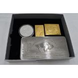 A 10 Troy Ounce Bar of Titanium, a 1996 1 oz Silver Canadian 5 Dollar Coin and two Silver Flags