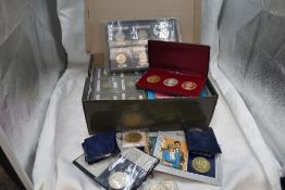 A box containing GB & World Coins including Threepences, Sixpences, Shillings, Florins, Half