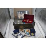 A box containing GB & World Coins including Threepences, Sixpences, Shillings, Florins, Half