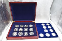 A collection of 21 Silver World crown sized Wildlife coins, in fitted case