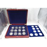 A collection of 21 Silver World crown sized Wildlife coins, in fitted case