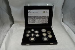 A Royal Mint silver proof twelve coin set 2009 containing a Kew Gardens fifty pence, with