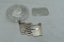 A USA 1993 Liberty 5oz .999 Silver Coin, a 1 troy oz .999 Silver USA Flag and a 1 troy oz .999 Bar