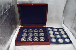 A collection of 24 Commonwealth Royalty crown sized silver coins, in fitted case