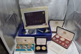 A collection of GB & World Coins including Sets and Five Pound Coins
