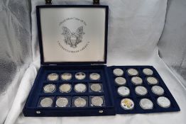 A collection of 24 USA silver coins, Morgan, Peace, Liberty etc in fitted case
