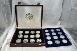 A collection of 24 Commonwealth Royalty silver coins in fitted wooden case
