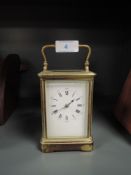 A brass cased carriage clock having stamp mark for Paris with internal chime