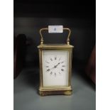 A brass cased carriage clock having stamp mark for Paris with internal chime