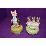 Two Rotating musical Beatrix potter ceramic collectable figurines by Schmid.