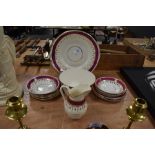 A part vintage tea set having cerise band and teal accents, with gilt edging, large bowl,jug,and