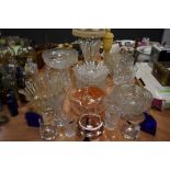 An array of glass ware, including Dartington glasses, cut and pressed glass fruit bowls, vases and