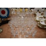 A large collection of mixed glass such as vases, wine glasses and similar including Cumbria