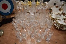 A large collection of mixed glass such as vases, wine glasses and similar including Cumbria