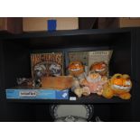 A selection of childrens board games and similar Garfield soft toys including Scrabble, Scotland