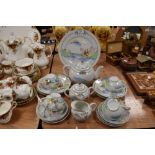 A part Lithopane tea set having silver gilt accents,transfer and hand painted details, including