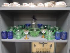 A selection of cocktail and party items including two tone green wine glasses and soda syphon