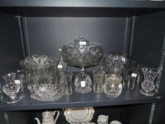A selection of clear cut and crystal glass wares including footed tazza etched and cut tumblers