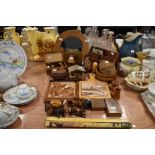 A selection of wood, including animal figurines, trivets, bowls, letter racks and more.