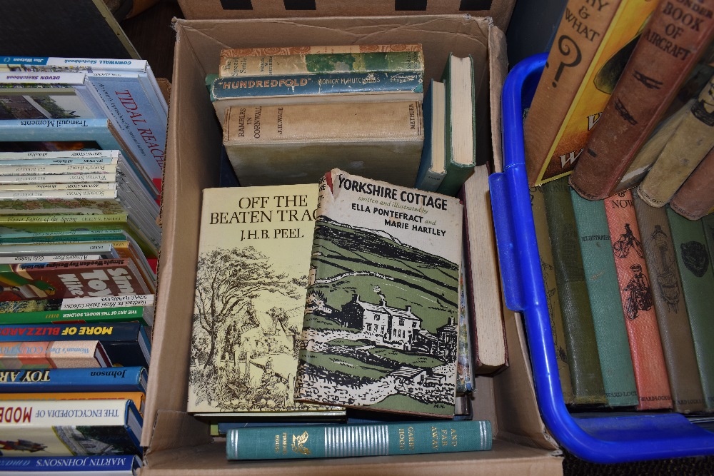 A variety of vintage country related books.