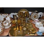 A large lot of vintage brass, including platters and chargers, boxes, jugs, bowls a door knocker and