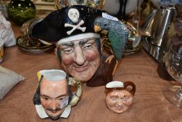 A Royal Doulton Long John Silver jug,a similar smaller one and an unmarked William Shakespeare.