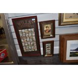 A framed collection of cigarette cards.