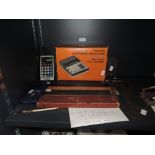 A selection of desktop office items including geometry interest and calculator