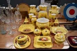 A large collection of Aynsley 'Orchard gold' including trinket boxes, vases, planters, and similar.
