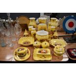 A large collection of Aynsley 'Orchard gold' including trinket boxes, vases, planters, and similar.