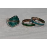 A pair of Norwegian silver and enamel band rings and a similar Norwegian silver and enamel dress