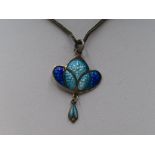 An Edwardian silver and enamel Art Nouveau pendant in shades of blue, Birmingham 1908, James