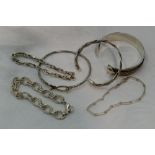 Six white metal bracelets and bangles, all stamped 925 and of various designs