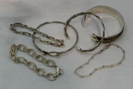 Six white metal bracelets and bangles, all stamped 925 and of various designs