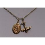 A 9ct gold rope chain with 9ct gold Plane charm and 10ct gold St Christopher pendant, approx 18' &