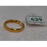 A 22ct gold wedding band of plain form, approx 8.3g & size U