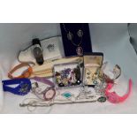 A selection of costume jewellery and wrist watches including cuff bangle, Paua shell jewellery,