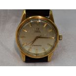 A gents 18ct gold Omega Seamaster automatic wrist watch no: 18293220, having a baton numeral dial to