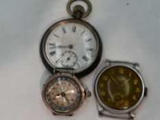A white metal top wound pocket watch stamped 935 having Roman numeral dial with subsidiary seconds