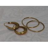 Two pairs of 9ct gold hoop earrings, approx 2.8g