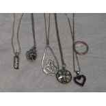 A selection of silver jewellery including band ring and pendants including Kit Heath ingot, sapphire