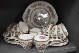 A Royal Grafton part tea service including cups and saucer milk jug and cake plate having oriental