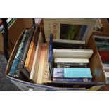 A selection of text and reference books including photography and nude calendar interest