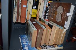 A mixed lot of books including novels and military interest.