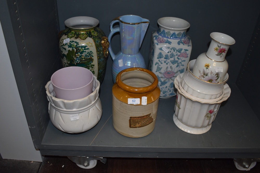 A selection of planters, a advertising stone ware jar for Hartle(y) strawberry (Jam?) a large lustre