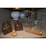 A pair of abstract oak book ends, and two lots of decorative glass and similar.