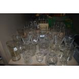 A collection of glass including Guinness glasses, tankards and wine glasses.