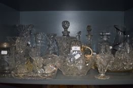 An array of vintage glass and crystal amongst which are cut, etched and pressed items, including