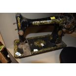 An antique Singer sewing machine.